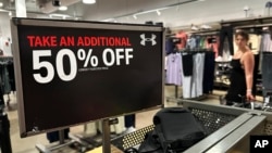 A sale sign is displayed at a retail store in Rosemont, Illinois, on June 25, 2024. Stronger consumer spending contributed to a 3% expansion in the U.S. economy in the second quarter of the year, the Commerce Department reported on Aug. 29, 2024.