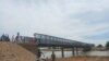 The South Sudan states of Gogrial, Tonj and Wau are now connected by the new bridge in Kuajob. Residents say until now, it has often been difficult, even treacherous to cross the Jur River. (Waakhe Simon Wudu/VOA) 