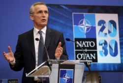 NATO Secretary-General Jens Stoltenberg speaks during a media conference ahead of a NATO defense minister's meeting at NATO headquarters in Brussels, Feb. 15, 2021.