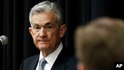 Federal Reserve Chairman Jerome Powell, listens to a attendee's question following his address to a rural policy forum at historically black Mississippi Valley State University in Itta Bena, Mississippi, Feb. 12, 2019.