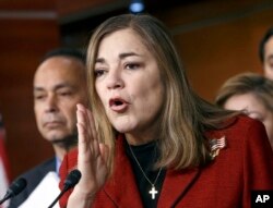 FILE - U.S. Rep. Loretta Sanchez, a California Democrat, pictured at a Capitol Hill news conference in February 2015, says small-business owners often find it financially difficult to offer paid family leave.