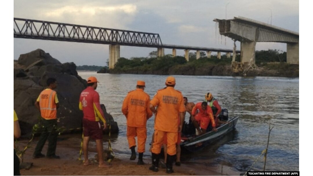 This handout photo released by the Tocantins Fire Department shows firefighters after the Juscelino Kubitschek de Oliveira bridge fell on Dec. 22, 2024, over the Tocantins River at the city of Aguiarnopolis, Tocantins state, Brazil.
