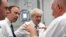 Britain's Prime Minister Boris Johnson, center, visit Pilgrim Hospital in Boston, northeast England, Aug. 5, 2019.