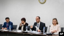 Syria's main opposition High Negotiations Committee (HNC) leader Nasr al-Hariri, 2nd right, and his delegation attend a meeting with U.N. Special Envoy for Syria Staffan de Mistura (not pictured), during Syria talks in Geneva, Switzerland, March 29, 2017.