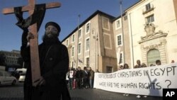 Coptic Christians gather in Rome, to demand religious freedom and protection following a church attack in Egypt that killed 21 worshipers.