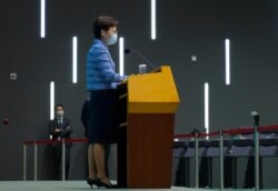 Hong Kong Chief Executive Carrie Lam listens to reporters' questions during a press conference in Hong Kong, May 26, 2020. Lam tried again Tuesday to defend a new national security law that China's parliament is going to impose on Hong Kong.