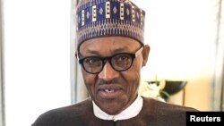 Shugaban Najeriya Muhammad Buhari wanda gwamnatinsa ta ayyana dokar rufe iyakokin kasar domin hana shinkafa shigowa tare da wasu kayan