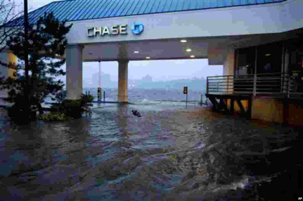 Rising water from the Hudson River overtakes a bank drive-through in Edgewater, New Jersey, October 29, 2012, as Hurricane Sandy lashed the East Coast.