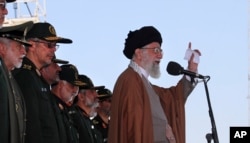 In this picture released by official website of the office of the Iranian supreme leader, May 10, 2017, Supreme Leader Ayatollah Ali Khamenei speaks during a graduation ceremony of a group of the Revolutionary Guard cadets in Tehran, Iran.