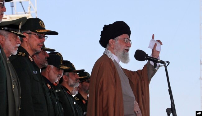 In this picture released by official website of the office of the Iranian supreme leader, May 10, 2017, Supreme Leader Ayatollah Ali Khamenei speaks during a graduation ceremony of a group of the Revolutionary Guard cadets in Tehran, Iran.