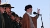 In this picture released by official website of the office of the Iranian supreme leader, May 10, 2017, Supreme Leader Ayatollah Ali Khamenei speaks during a graduation ceremony of a group of the Revolutionary Guard cadets in Tehran, Iran. 