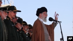 In this picture released by official website of the office of the Iranian supreme leader, May 10, 2017, Supreme Leader Ayatollah Ali Khamenei speaks during a graduation ceremony of a group of the Revolutionary Guard cadets in Tehran, Iran. 