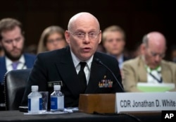 Federal Health Coordinating Official for the 2018 UAC Reunification Effort Cmdr. Jonathan White testifies as the Senate Judiciary Committee holds a hearing on the Trump administration's policies on immigration enforcement and family reunification efforts, on Capitol Hill in Washington, July 31, 2018.