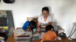 Nisakorn Quispe has been homeschooling her children for a few weeks due to school closures amid the COVID-19 pandemic in Queens, New York City.