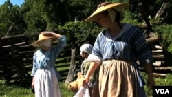 Staff at Claude Moore Colonial Farm in period clothing.