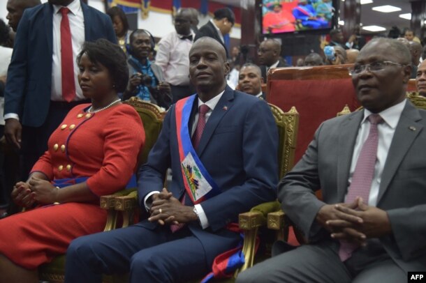 New Haitian President Jovenel Moise(C) sits after receiving his sash, during his Inauguration, at the Haitian Parliament in Port-au-Prince, on Feb. 7, 2017.