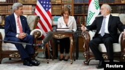 Američki državni sekretar, Džon Keri na sastanku sa iračkim šefom diplomatije, Ibrahimom al Džafrijem u Bagdadu, 10. septembar 2014.