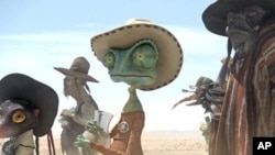 Left to right: Priscilla (Abigail Breslin), Rango (Johnny Depp), and Wounded Bird (Gil Birmingham) in RANGO, from Paramount Pictures and Nickelodeon Movies.