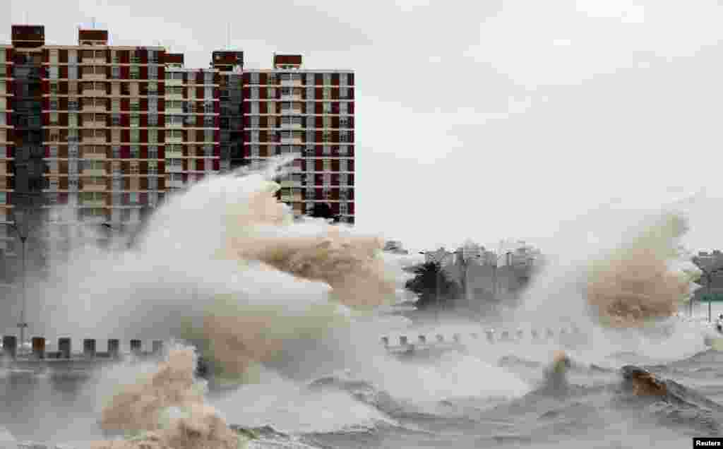 Waves hit the city's waterfront during a wind storm in Montevideo, Uruguay, Oct. 27, 2016. 