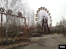 FILE - The Ferris wheel in the Pripyat amusement park, now an iconic symbol to a younger generation born after the Chernobyl disaster, thanks to its inclusion in the video game: Call of Duty 4: Modern Warfare.