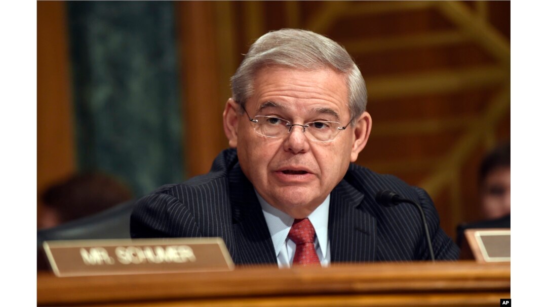 FILE - Sen. Robert Menendez, D-N.J. addresses fellow members of the Senate Banking Committee in Washington, Jan. 27, 2015.