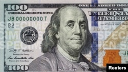 FILE - The front of the newly designed $100 bill.