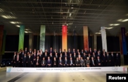 Los ministros de finanzas y presidentes del Banco Central posan para la foto oficial en la Reunión de Ministros de Finanzas del G20 en Buenos Aires, Argentina, el 21 de julio de 2018. REUTERS / Marcos Brindicci -