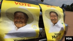 Posters in support of Uganda President Yoweri Museveni are seen at a rally in Kisaasi, a suburb of Kampala, Uganda, Feb. 16, 2016. 