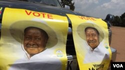 FILE - Posters in support of Ugandan President Yoweri Museveni are seen at a rally in Kisaasi, Feb. 16, 2016. Museveni won the election that month, drawing 60 percent of the vote.
