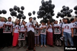 Activists gather at a rally, calling for the release of imprisoned Reuters journalists Wa Lone and Kyaw Soe Oo, one year after they were arrested, in Yangon, Myanmar, Dec.12, 2018.