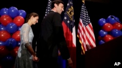 FILE - Democratic candidate for 6th congressional district Jon Ossoff, right, steps onstage with his fiancee Alisha Kramer to announce he conceded to Republican Karen Handel at his election night gathering in Atlanta, Georgia, June 20, 2017.