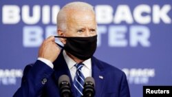 រូបឯកសារ៖ លោក Joe Biden បេក្ខជនប្រធានាធិបតីខាងគណបក្សប្រជាធិបតេយ្យ ចូលរួមថ្លែងនៅក្នុងយុទ្ធនាការឃោសនារកសំឡេងឆ្នោត នៅទីក្រុង New Castle រដ្ឋ Delaware កាលពីថ្ងៃទី២១ ខែកក្កដា ឆ្នាំ២០២០។