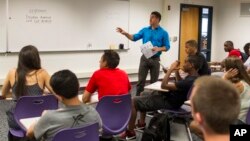 In this 2013 file photo, Ivan Silverberg teaches his American Studies class at Niles North High School in Skokie, Illinois. (AP Photo/Scott Eisen)