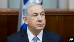 ນາຍົກ ລມຕ Benjamin Netanyahu ແຫ່ງອິສແອລ. 