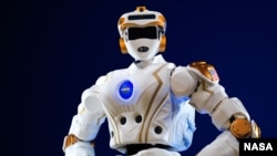 NASA’s R5 robot, which is NASA's newest humanoid robot and was built to compete in the DARPA Robotics Challenge.
