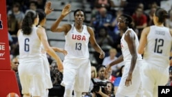 United States’ Sylvia Fowles with the team USA during the first half of a women's exhibition basketball game, July 29, 2016, in Bridgeport, Conn.