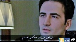 Iranian-American Amir Mirza Hekmati, who has been sentenced to death by Iran's Revolutionary Court on the charge of spying for the CIA, speaks in this undated still image taken from video in an undisclosed location in Iran, January 9, 2012.