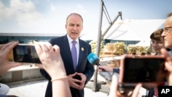 FILE — Micheal Martin, Ireland's minister of foreign affairs and defense speaks to the media during the COP27 summit, in Sharm el-Sheikh, Egypt, on November 7, 2022. 