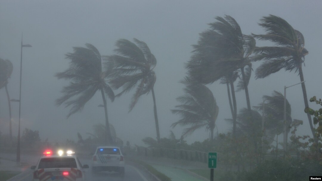 Police patrol the area as Hurricane Irma slams across islands in the northern Caribbean on Wednesday, in San Juan, Puerto Rico September 6, 2017. 