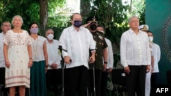 From right, Mexican President Andres Manuel Lopez Obrador, Guatemalan President Alejandro Giammattei and his Interior Secretary Olga Sanchez Cordero take part in the Appeal for Forgiveness for Grievances to the Mayan People ceremony, May 3, 2021.