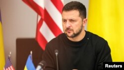 Президент Украины Владимир Зеленский выступает на заседании Контактной группы по вопросам обороны Украины в штаб-квартире НАТО в Брюсселе, Бельгия, 11 октября 2023 г.