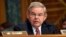 Sen. Robert Menendez, D-N.J. addresses fellow members of the Senate Banking Committee in Washington, Jan. 27, 2015.