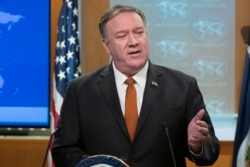 Secretary of State Mike Pompeo speaks with reporters at the State Department, Nov. 26, 2019 in Washington.