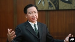 Taiwanese Foreign Minister Joseph Wu speaks during an exclusive interview with The Associated Press at his ministry in Taipei, Taiwan, Dec. 10, 2019. 