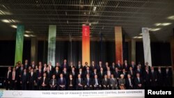 Ministros de finanzas y jefes de bancos centrales de los países del G20 posan para la foto oficial de la reunión del grupo en Buenos Aires, Argentina. Julio 21 de 2018, REUTERS/Marcos Brindicci.