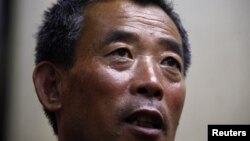 Chen Guangfu, the eldest brother of blind Chinese activist Chen Guangcheng, Beijing, May 23, 2012.