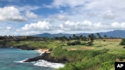 FILE - A golf course is seen in Lihue, Hawaii, on the east side of Kauai, Nov. 15, 2018. A tour helicopter that took off Dec. 26, 2019, from Lihue with seven people on board has gone missing.