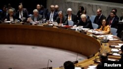 British Foreign Secretary Boris Johnson sits next to United Nations Secretary General Antonio Guterres as Johnson chairs a U.N. Security Council meeting on South Sudan at U.N. headquarters in New York City, New York, U.S. March 23, 2017. 