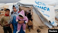 Pengungsi Suriah di kamp Al-Zaatari di kota Mafraq, Yordania (foto: dok). UNHCR mengatakan lebih dari 45,2 juta orang tergusur dari tempat tinggal mereka selama tahun 2012, naik dari 42,5 juta tahun sebelumnya.