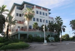 FILE - The Ugland House, the registered office for thousands of global companies, stands in George Town on Grand Cayman Island, Aug. 3, 2012.